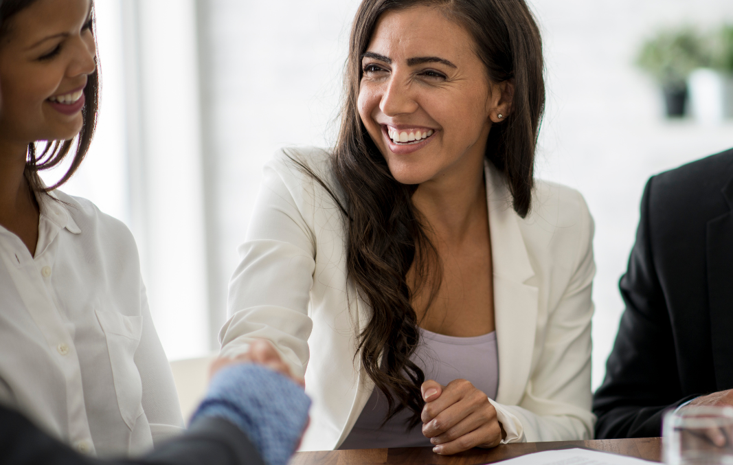Candidate shaking hands after landing a job